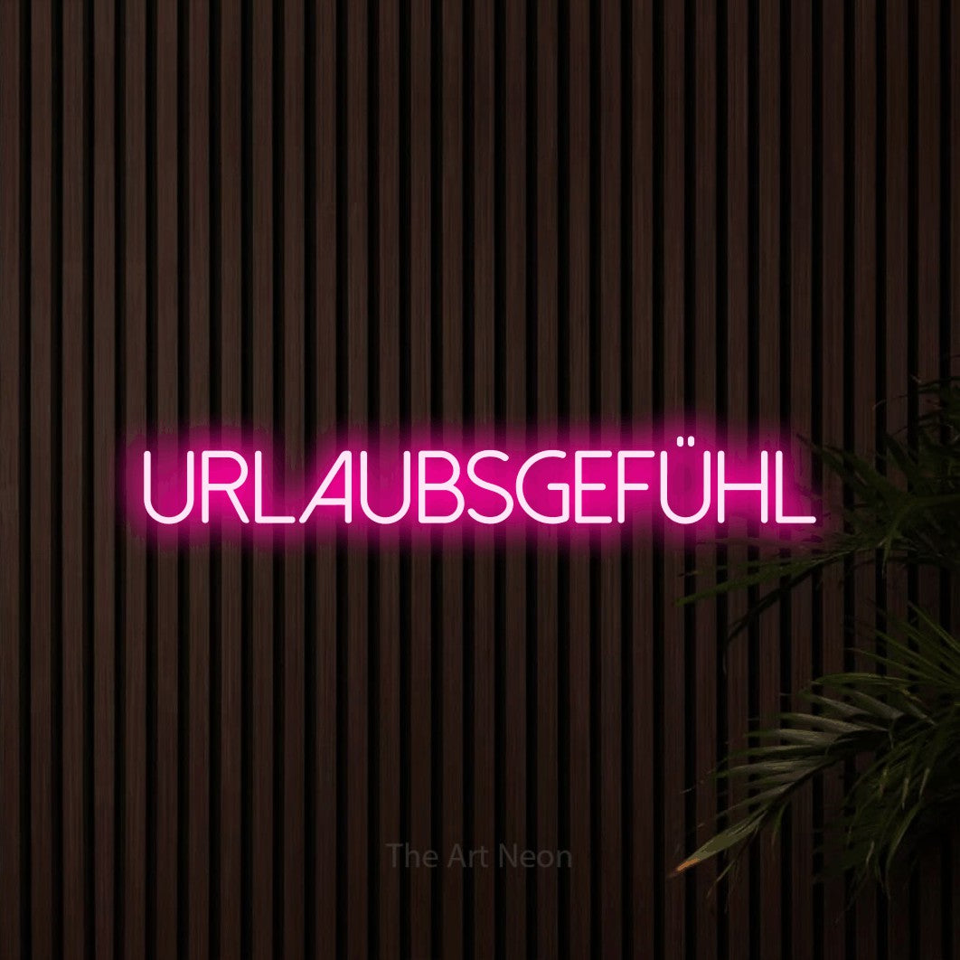 LED neon sign reading “urlaubsgefühl”, arranged in a single line.
