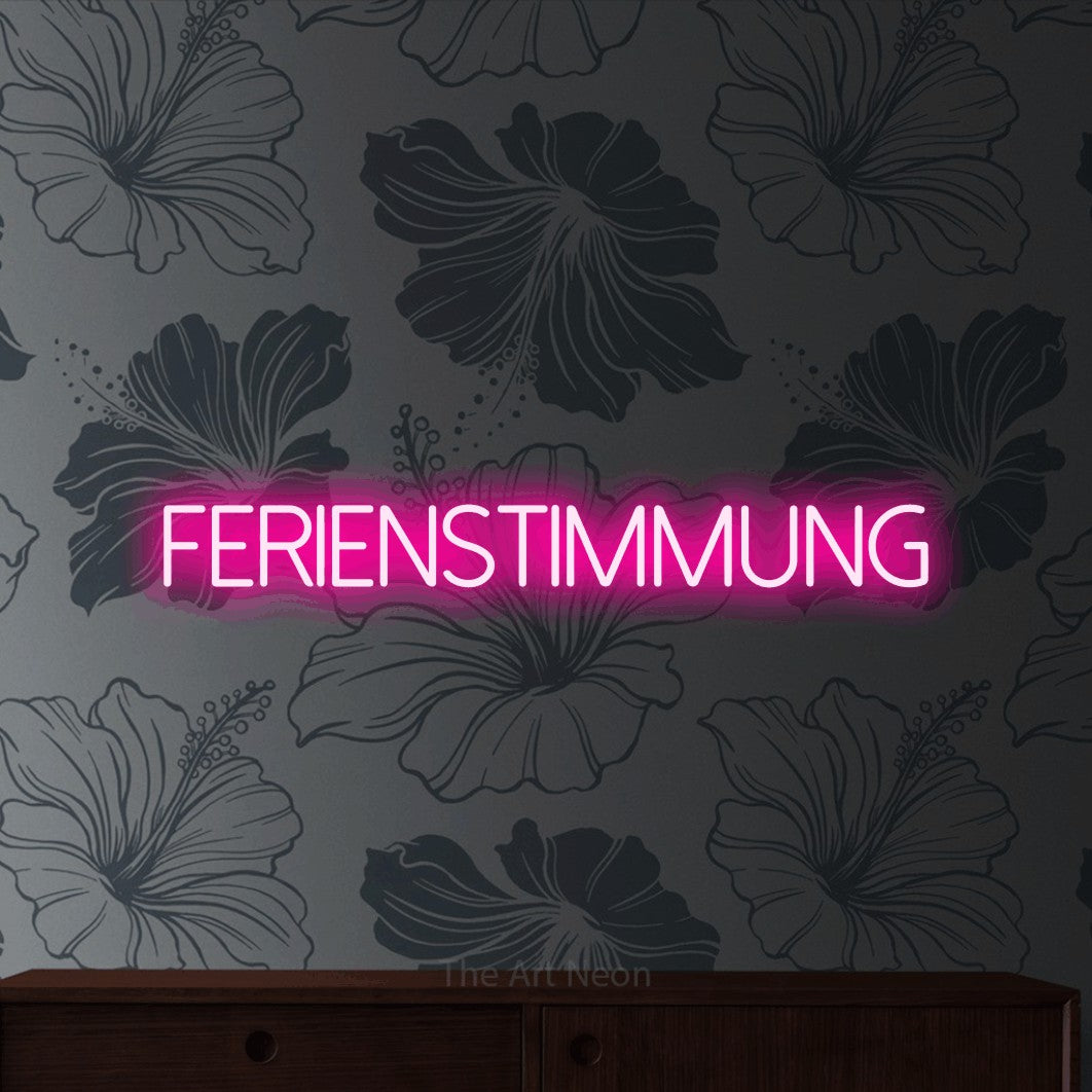 LED neon sign reading “ferienstimmung”, arranged in a single line.