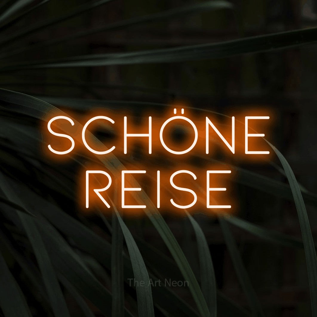 LED neon sign reading “schöne reise”, arranged in 2 lines.