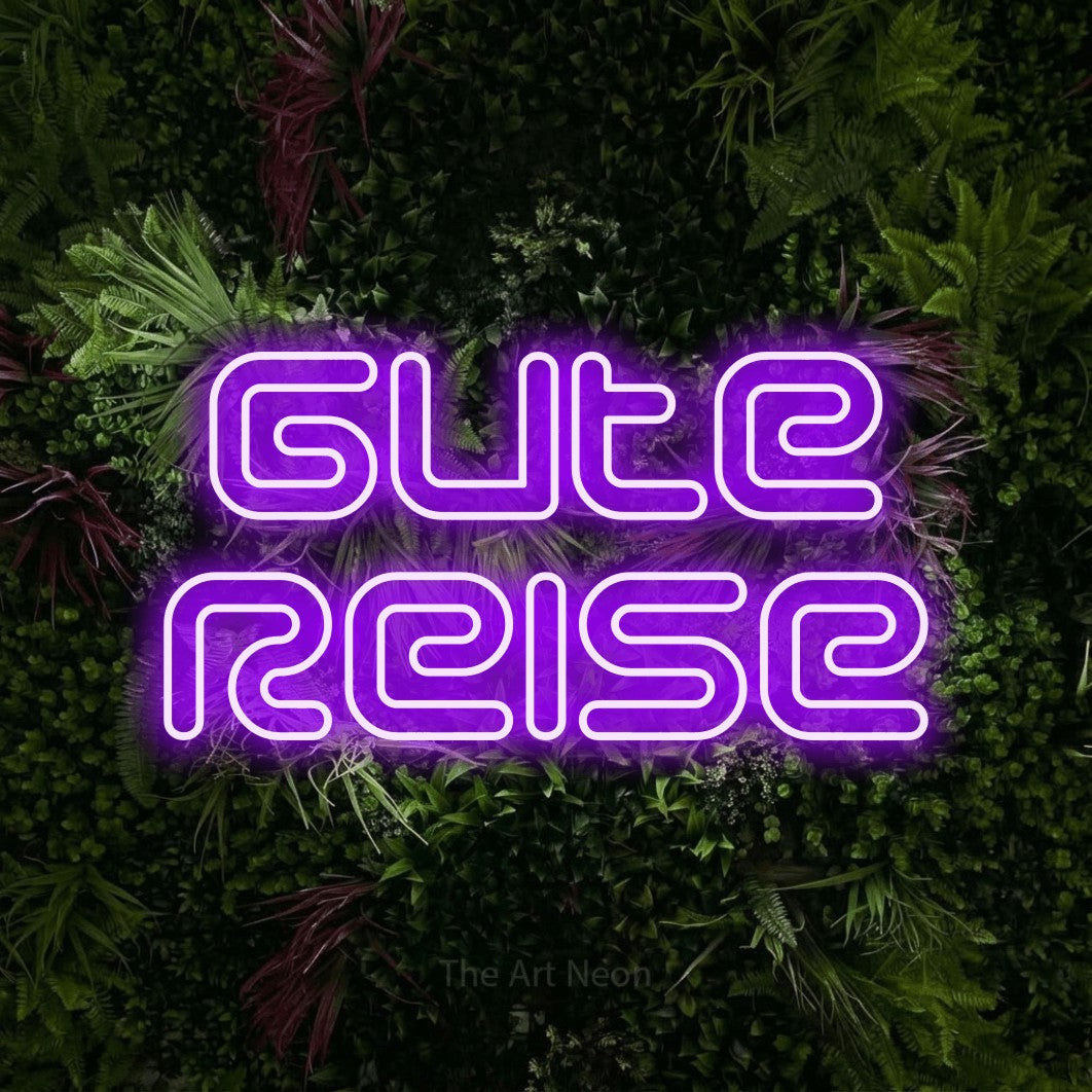 LED neon sign reading “Gute Reise”, arranged in 2 lines.