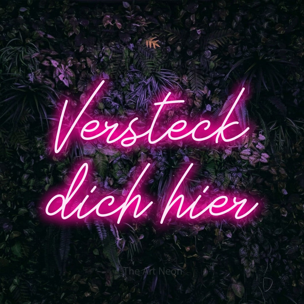 LED neon sign reading “Versteck dich hier”, arranged in 2 lines.