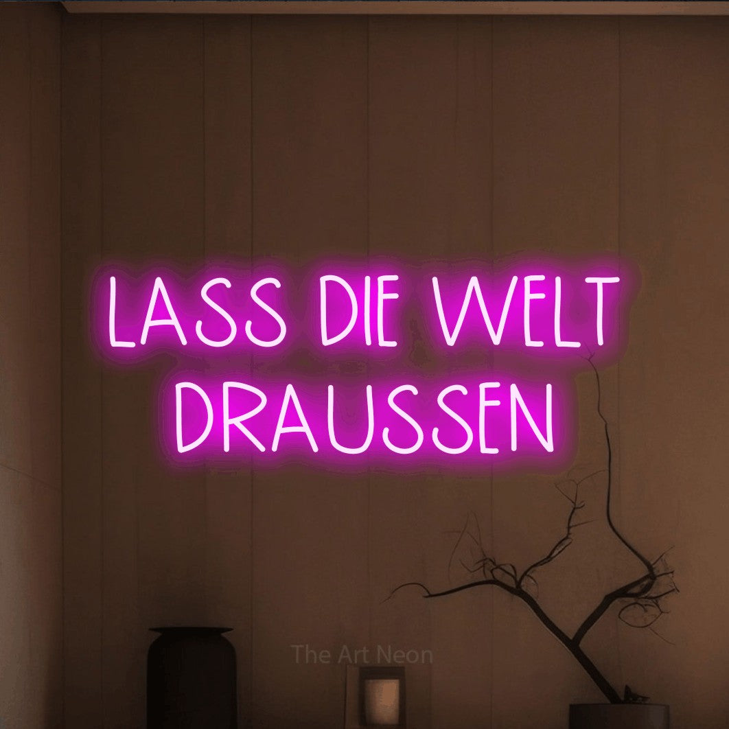 LED neon sign reading “LASS DIE WELT DRAUSSEN”, arranged in 2 lines.