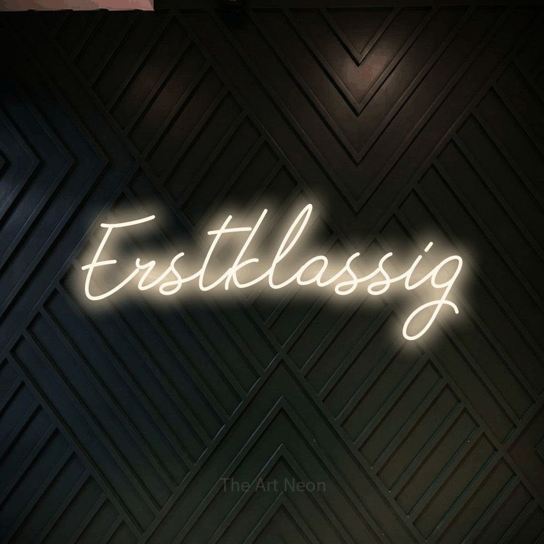 LED neon sign reading “Erstklassig”, arranged in a single line.