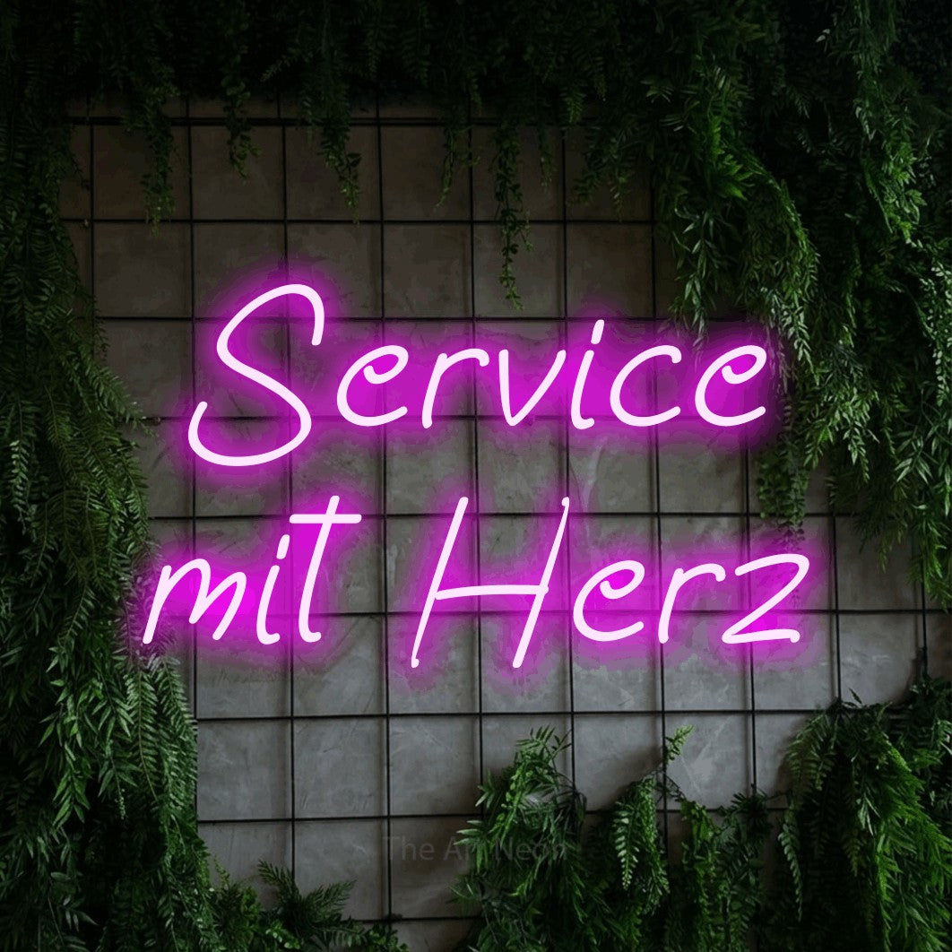 LED neon sign reading “Service mit Herz”, arranged in 2 lines.