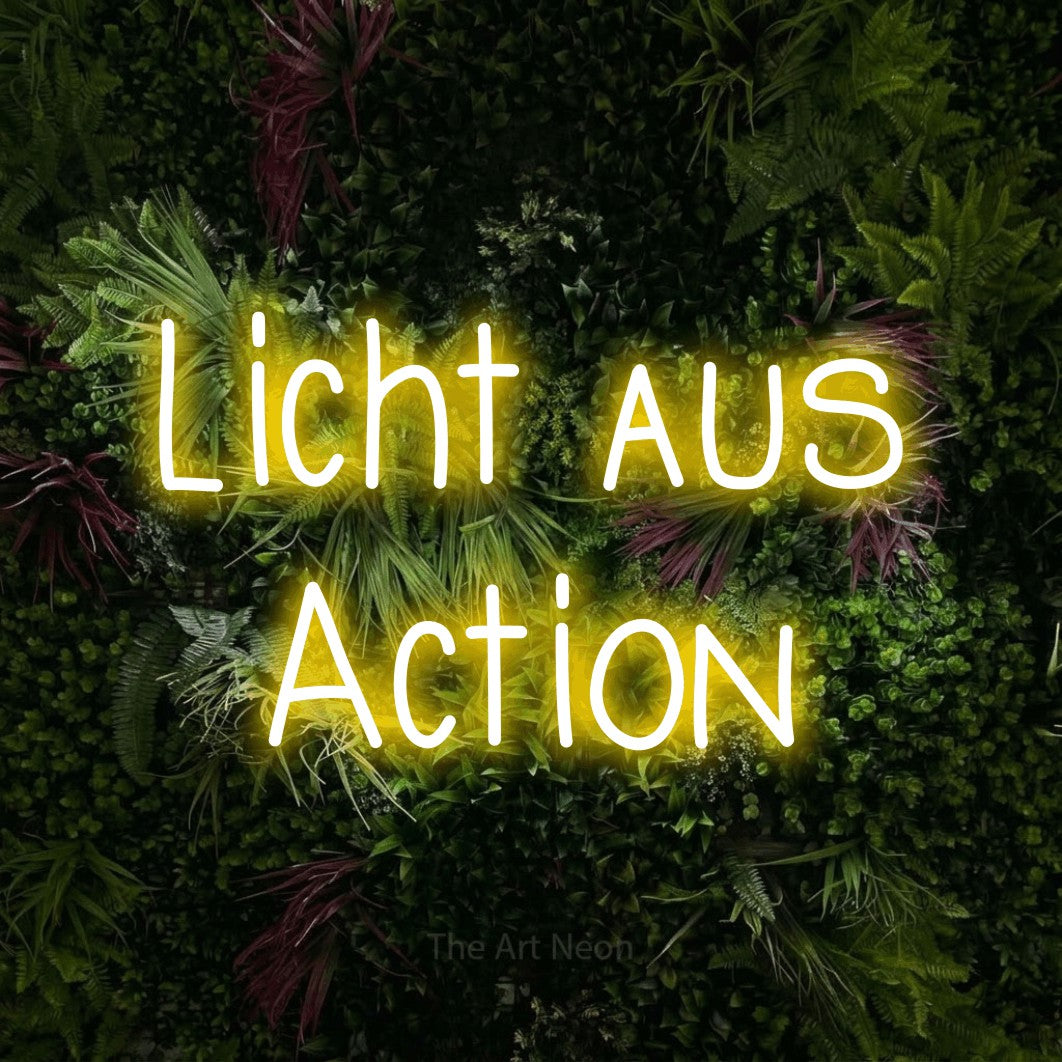 LED neon sign reading “Licht aus Action”, arranged in 2 lines.