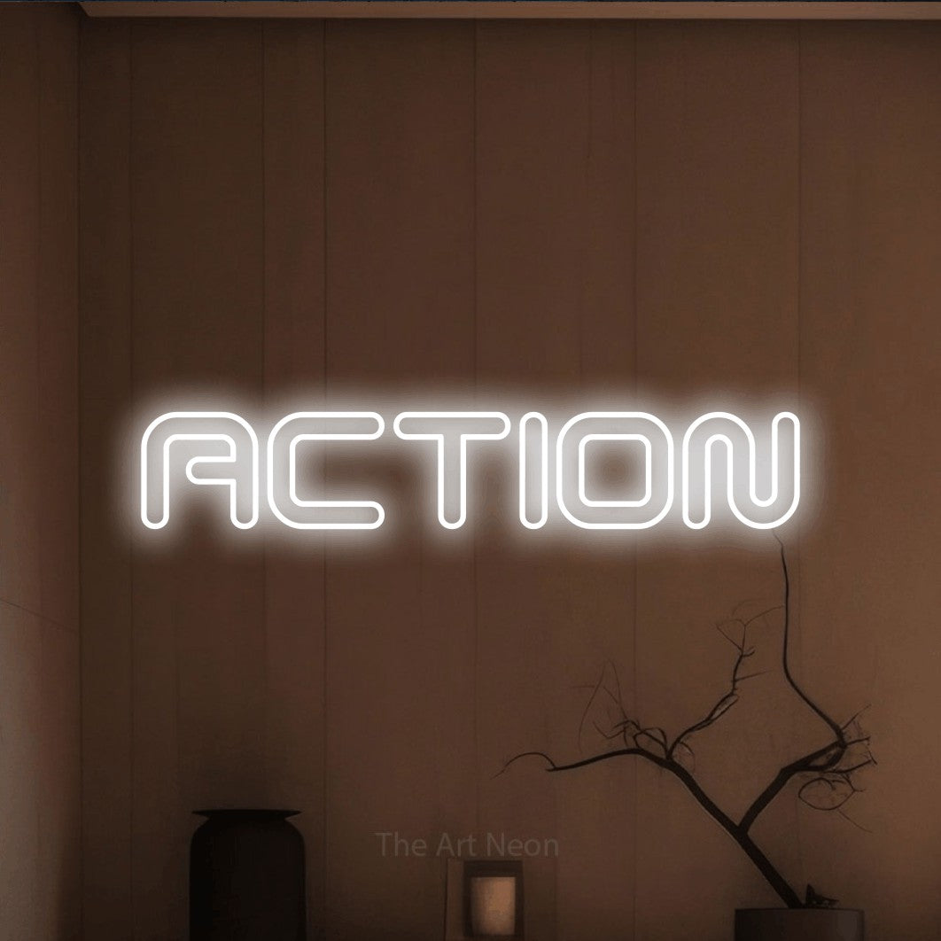 LED neon sign reading “ACTION”, arranged in a single line.