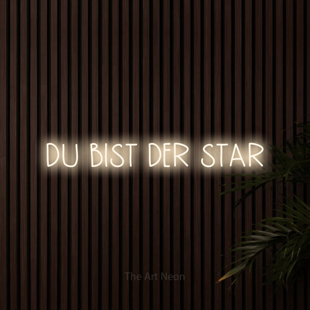 LED neon sign reading “DU BIST DER STAR”, arranged in a single line.