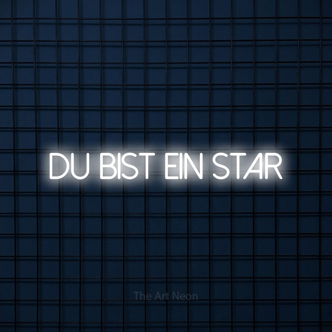 LED neon sign reading “DU BIST EIN STAR”, arranged in a single line.