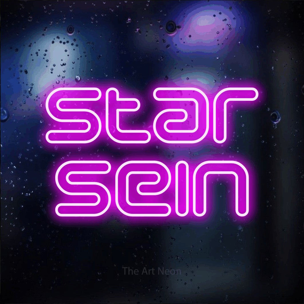 LED neon sign reading “Star sein”, arranged in 2 lines.