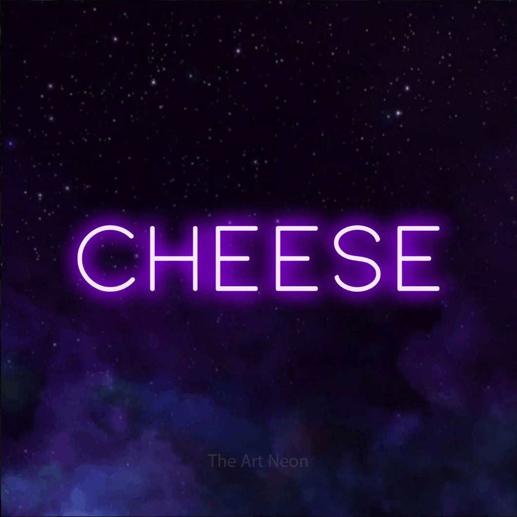 LED neon sign reading “cheese”, arranged in a single line.