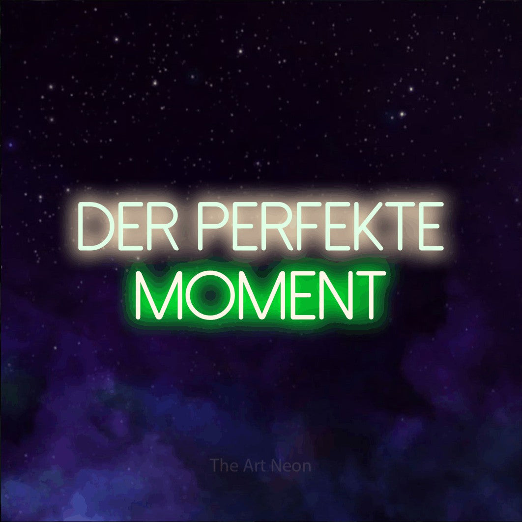 LED neon sign reading “Der perfekte Moment”, arranged in 2 lines.