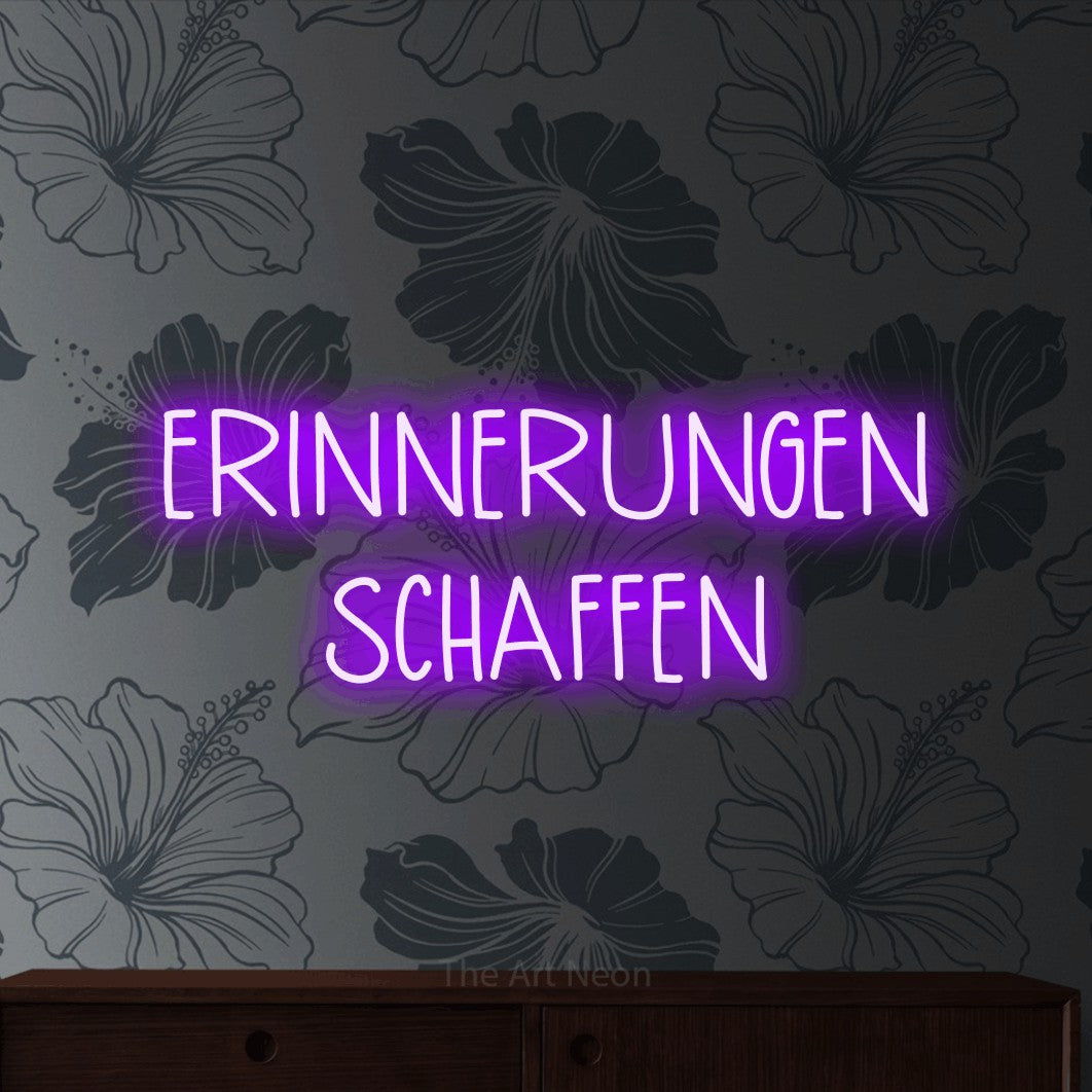 LED neon sign reading “ERINNERUNGEN SCHAFFEN”, arranged in 2 lines.