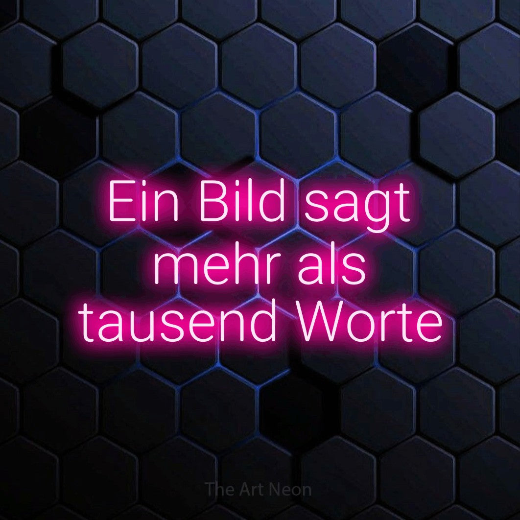 LED neon sign reading “Ein Bild sagt mehr als tausend Worte”, arranged in 3 lines.