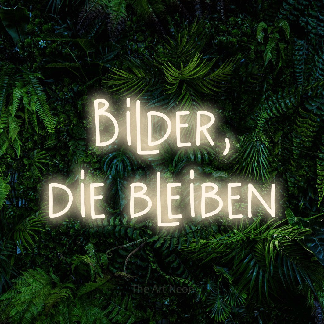 LED neon sign reading “Bilder, die bleiben”, arranged in 2 lines.