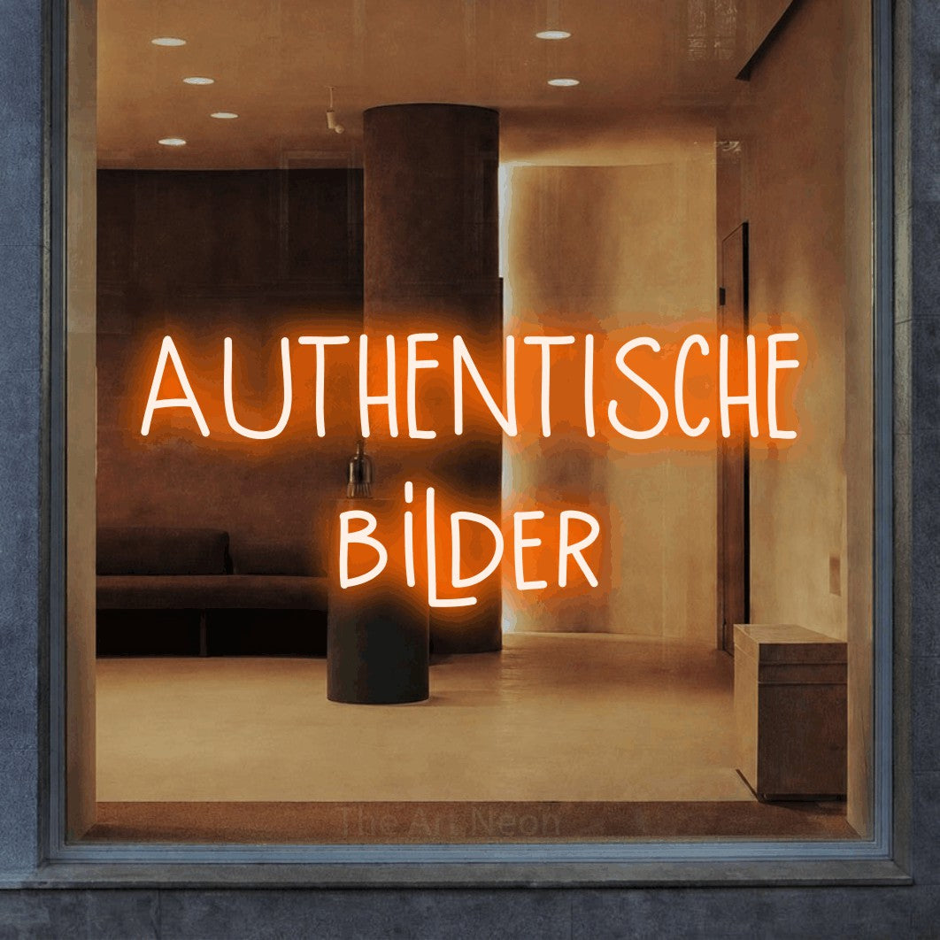 LED neon sign reading “AUTHENTISCHE bilder”, arranged in 2 lines.
