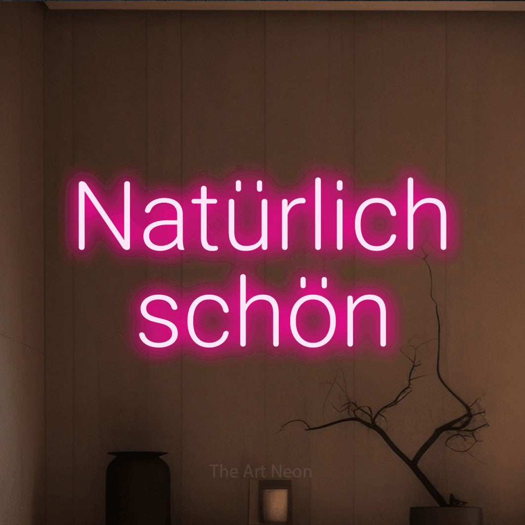 LED neon sign reading “Natürlich schön”, arranged in 2 lines.