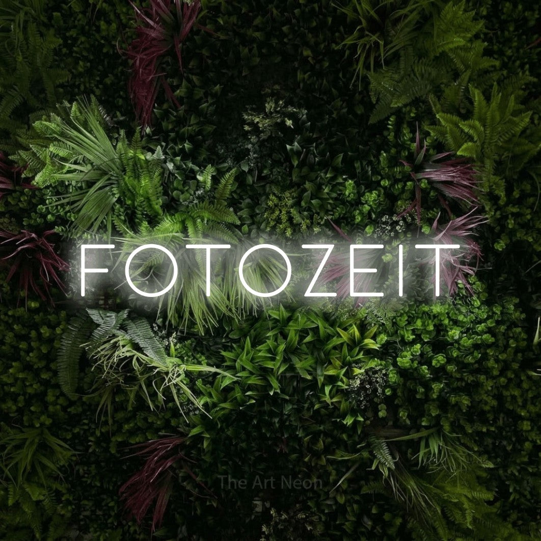 LED neon sign reading “Fotozeit”, arranged in a single line.