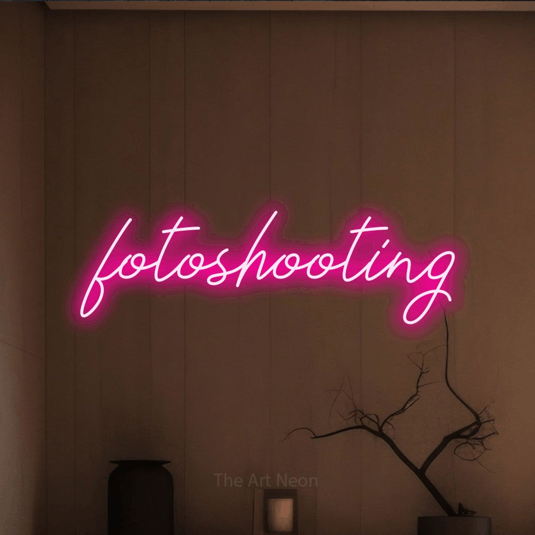 LED neon sign reading “fotoshooting”, arranged in a single line.