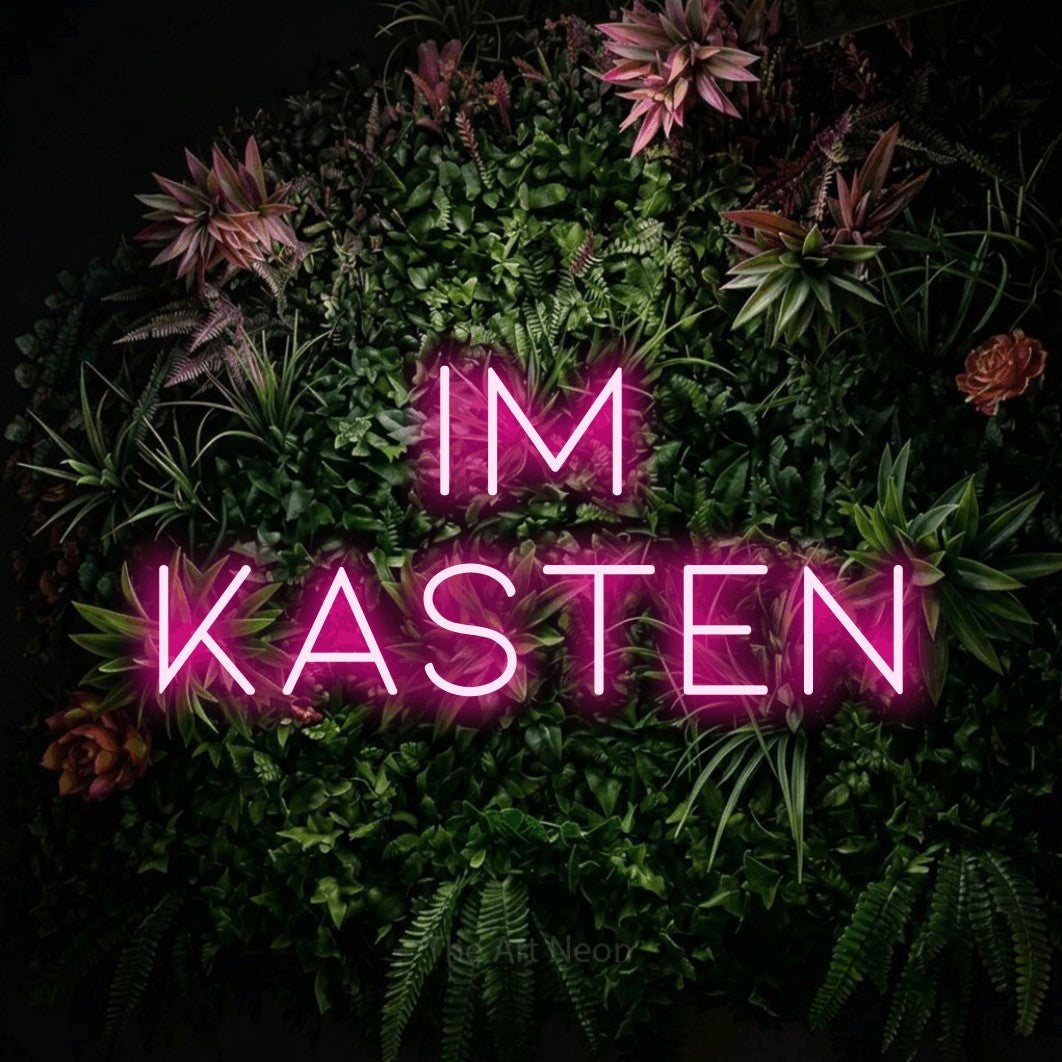LED neon sign reading “IM KASTEN”, arranged in 2 lines.