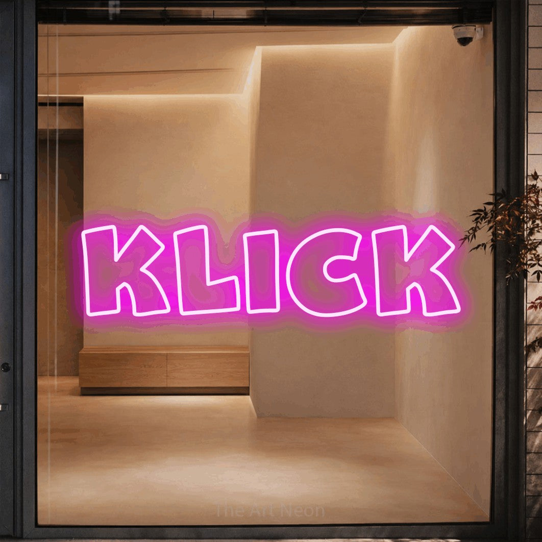 LED neon sign reading “klick”, arranged in a single line.