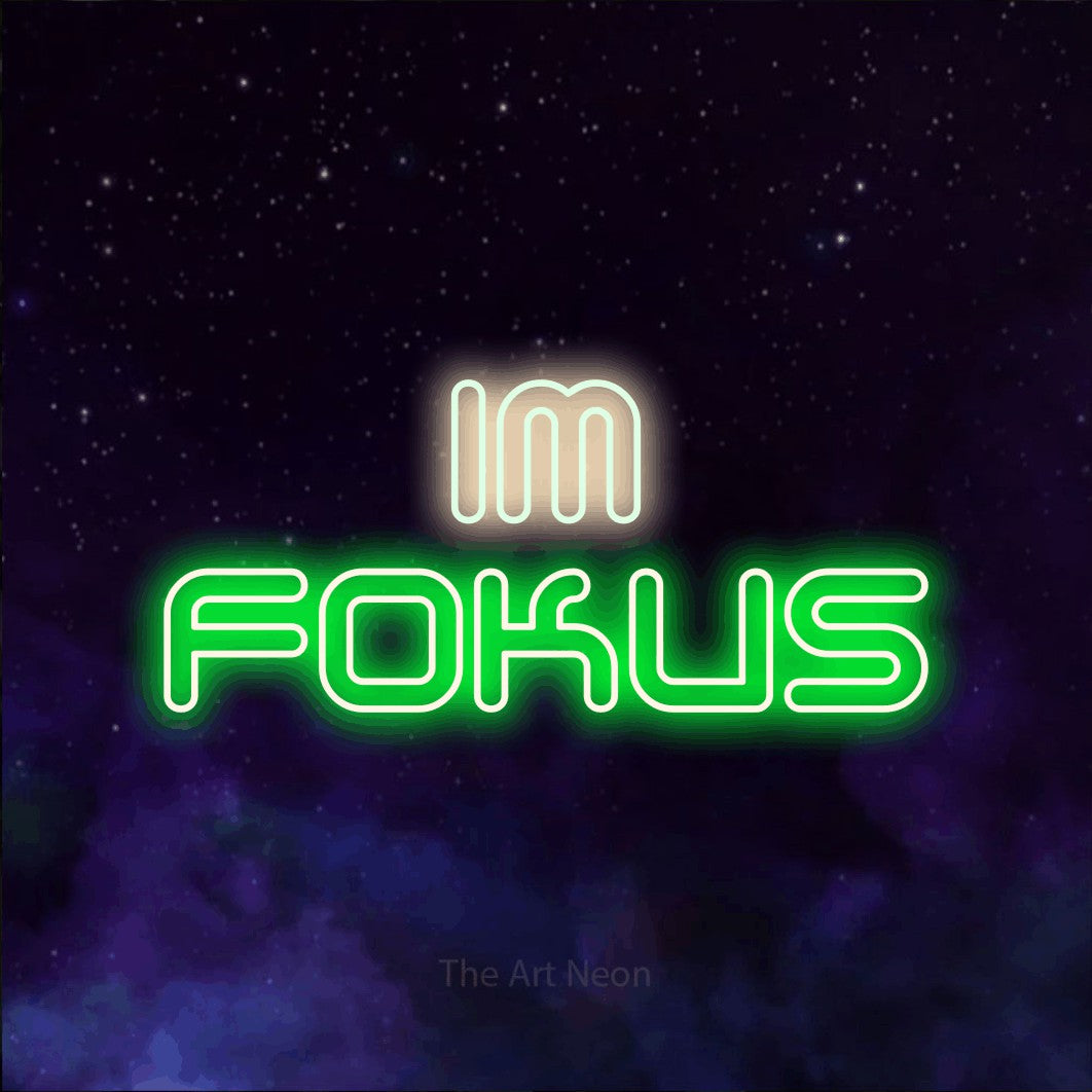 LED neon sign reading “im fokus”, arranged in 2 lines.