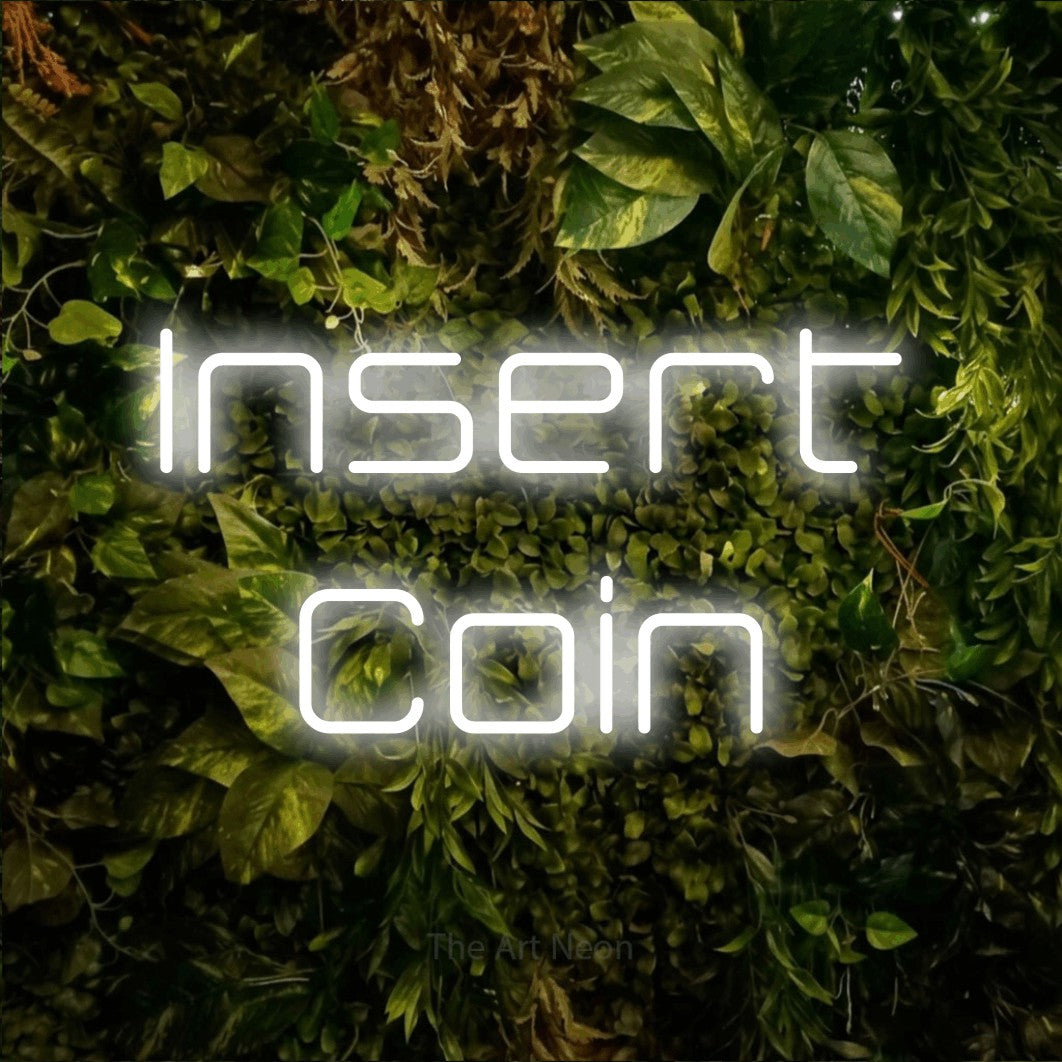 LED neon sign reading “Insert Coin”, arranged in 2 lines.