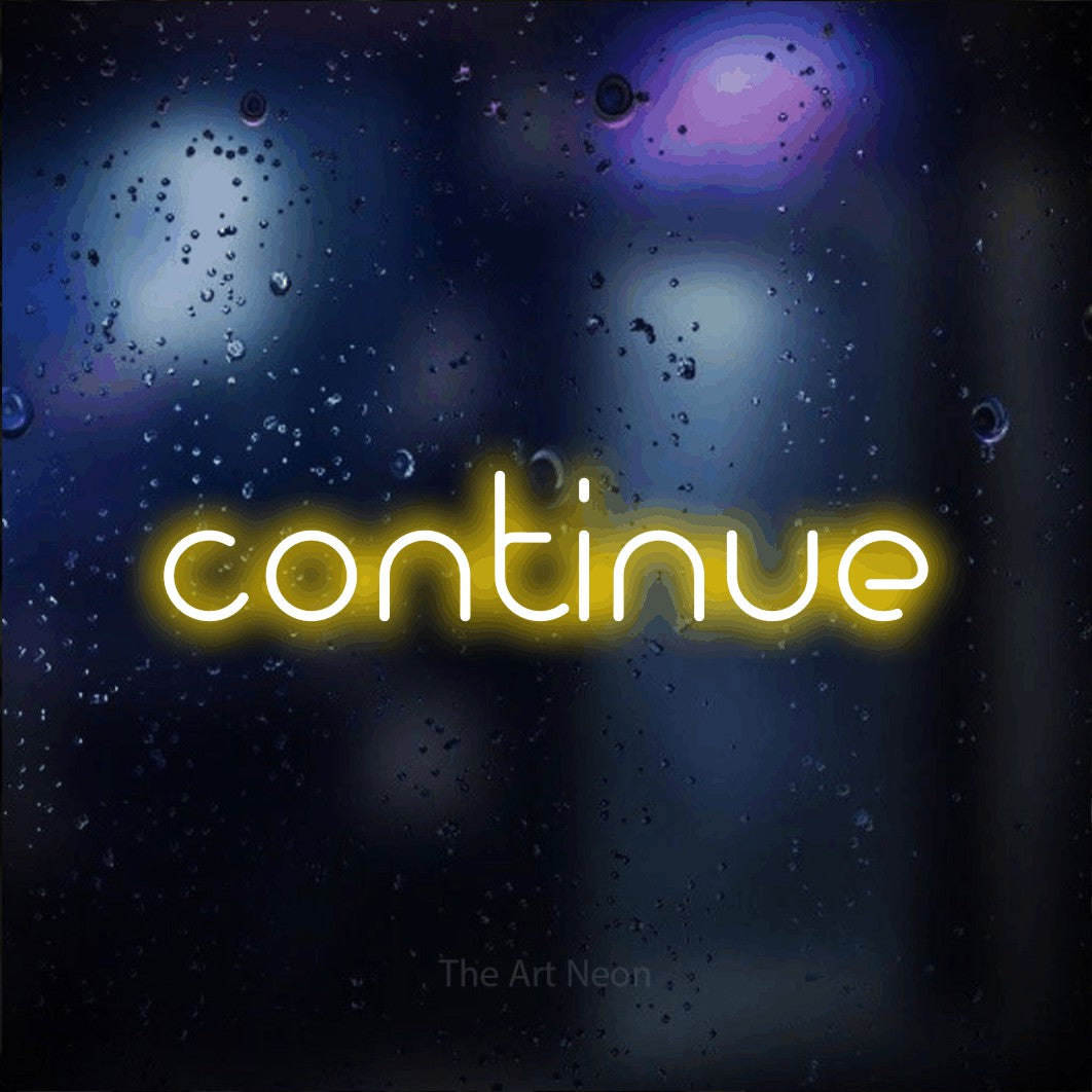 LED neon sign reading “continue”, arranged in a single line.