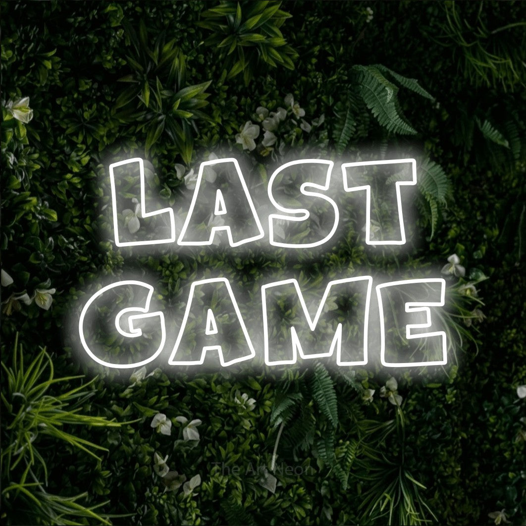 LED neon sign reading “Last Game”, arranged in 2 lines.