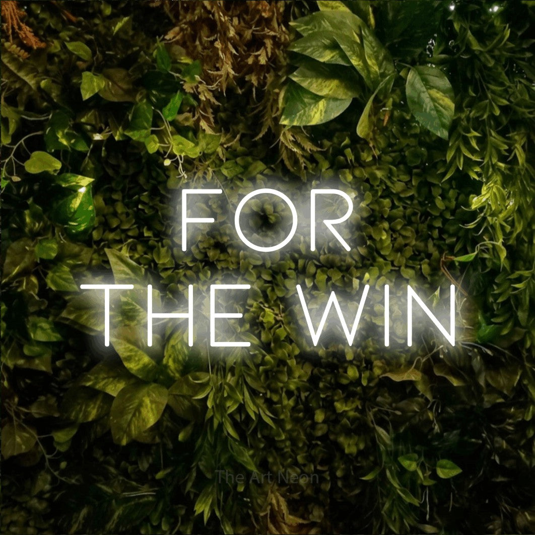 LED neon sign reading “for the win”, arranged in 2 lines.