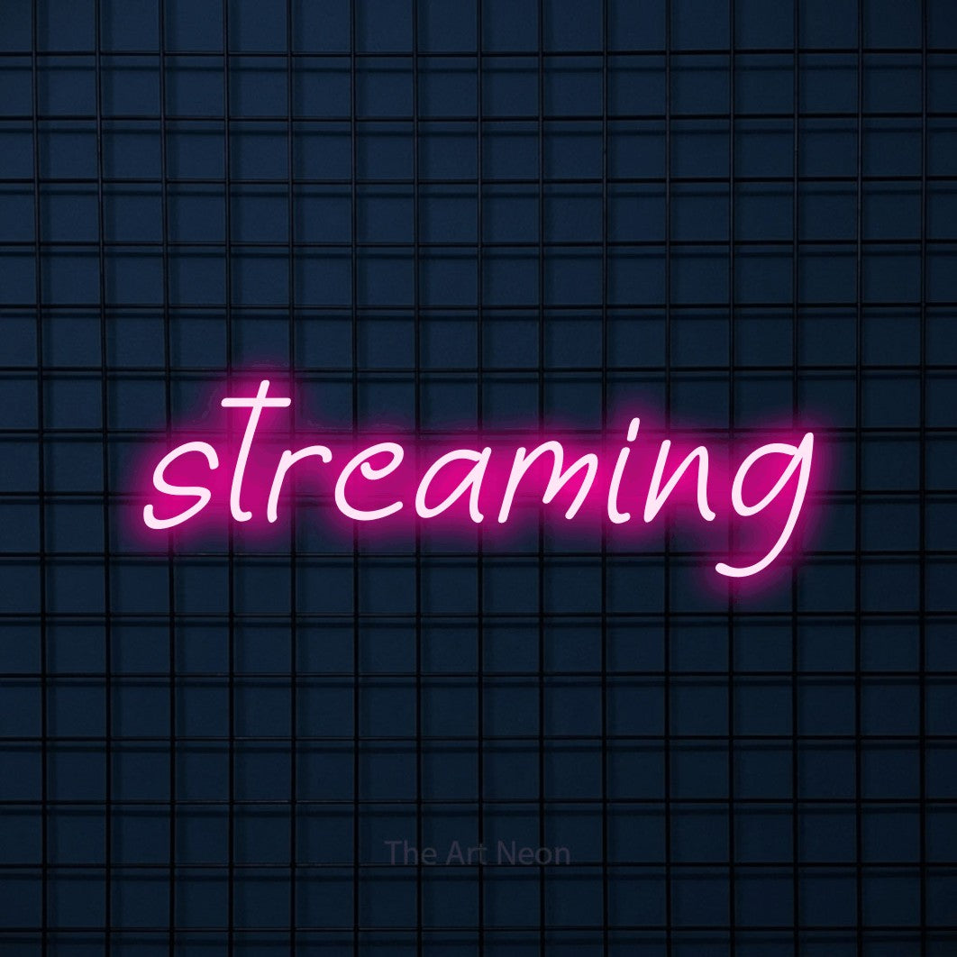 LED neon sign reading “streaming”, arranged in a single line.