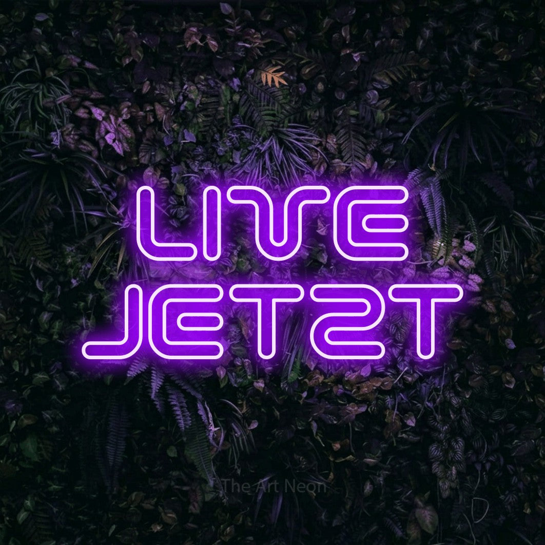 LED neon sign reading “LIVE JETZT”, arranged in 2 lines.