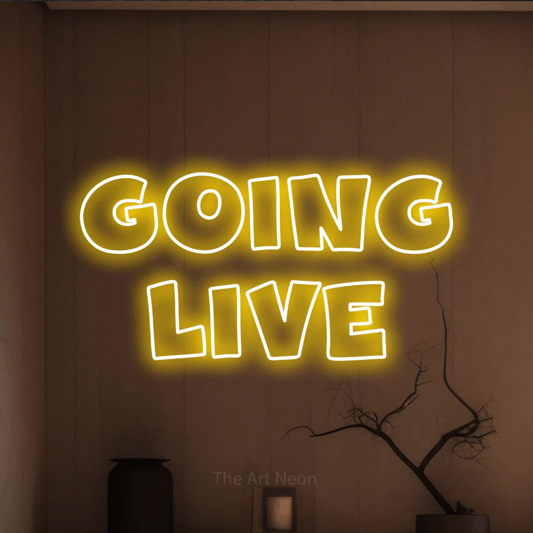 LED neon sign reading “GOING live”, arranged in 2 lines.