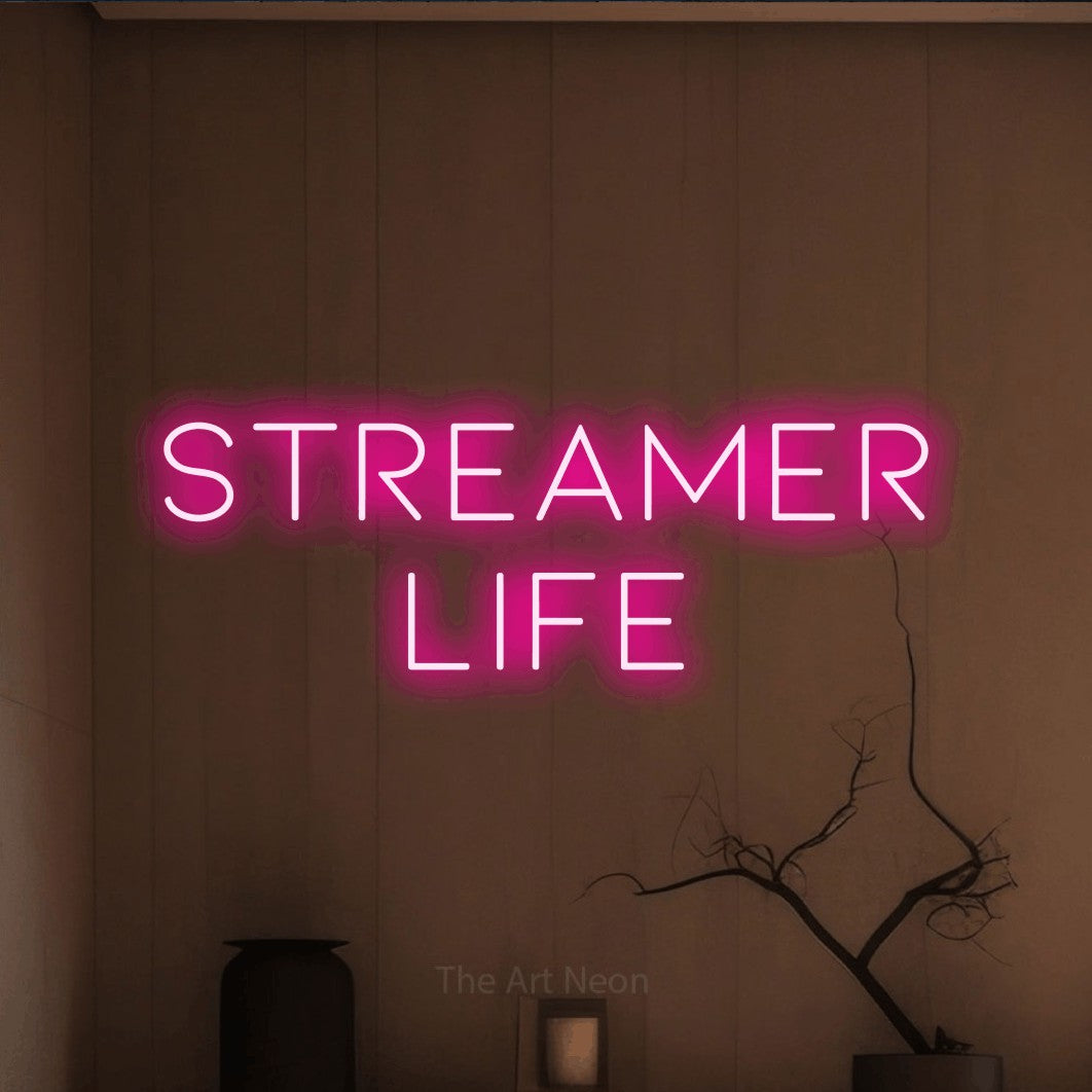 LED neon sign reading “STREAMER life”, arranged in 2 lines.