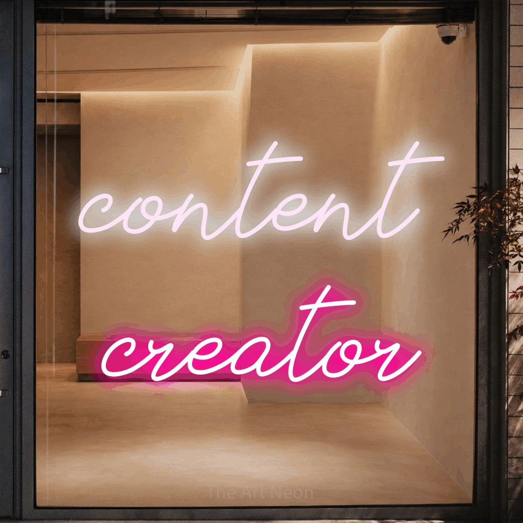 LED neon sign reading “content creator”, arranged in 2 lines.