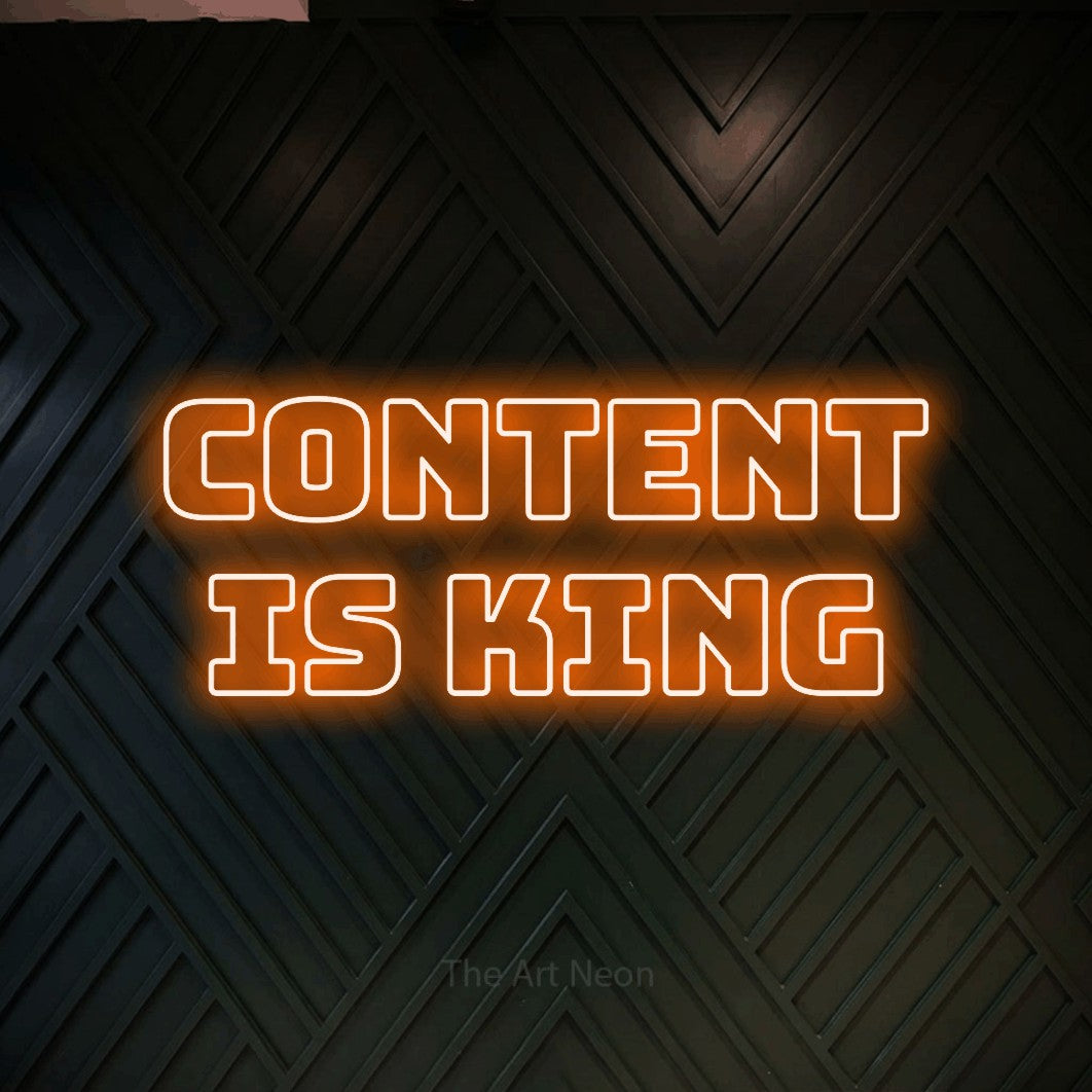 LED neon sign reading “CONTENT IS KING”, arranged in 2 lines.