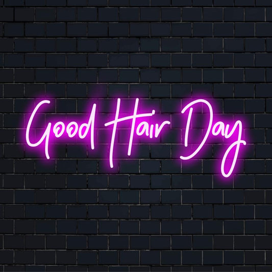 Custom LED neon sign spelling Good Hair Day in bold, glowing letters; versatile neon light decor for vibrant spaces.