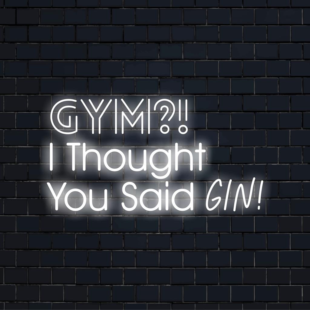 Vibrant pink and blue neon sign reading Gym? I Thought You Said Gin! adds whimsy to your decor, brimming with fun loveness.