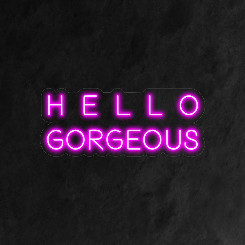 „Hello Gorgeous Neon Sign“ – Eine glamouröse und schmeichelhafte Ergänzung für Schönheitssalons, Boutiquen oder jeden Raum, der Besucher mit einem Hauch von Eleganz und Stil begrüßen möchte.