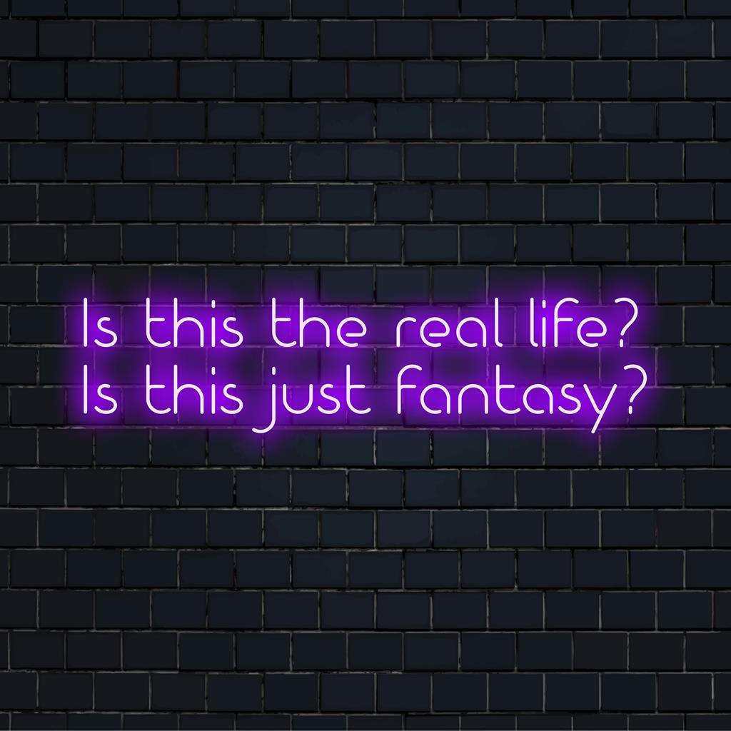 Custom LED neon sign featuring the text Is This The Real Life Is This Just Fantasy illuminated in bright, captivating colors.