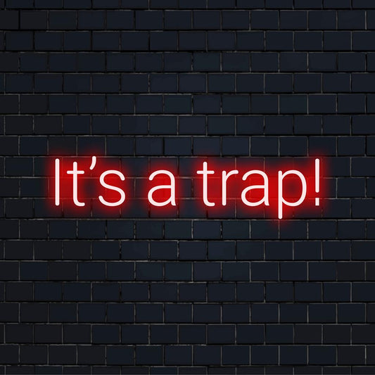 Custom-made LED neon sign featuring the phrase It's A Trap! in bright, striking neon glow, perfect for unique wall decor.