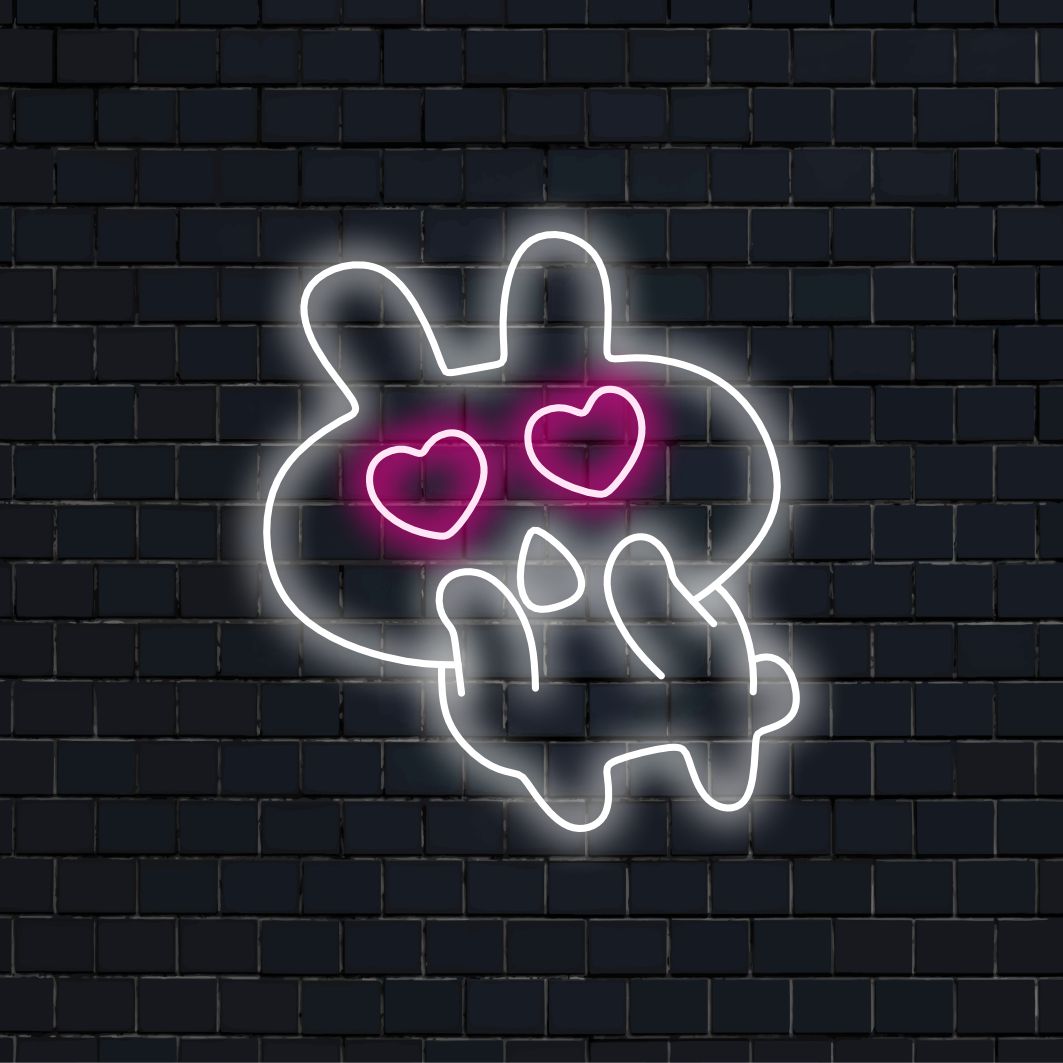 „Lovestruck Bunny Neon Sign“ ist eine bezaubernde und charmante Ergänzung für Räume voller Laune und Liebe. Erleuchten Sie mit Hasen-inspiriertem Zauber!