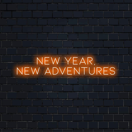 Vibrant LED neon sign illuminating 'New Year, New Adventures'—perfect for personalized wall decor and celebratory ambiance.