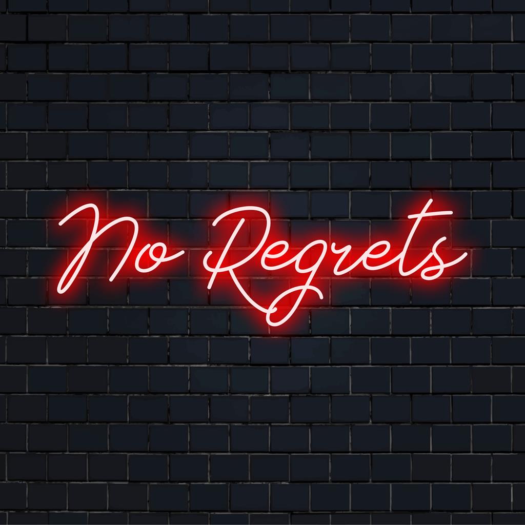 LED neon sign with the phrase No Regrets in bold, vibrant lighting; catchy decor piece for modern interiors.