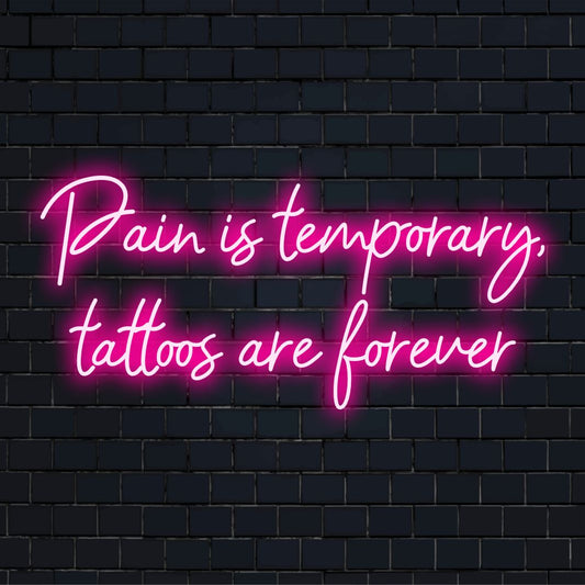 Custom-made LED neon sign with the phrase Pain Is Temporary, Tattoos Are Forever illuminated in vibrant neon lighting.