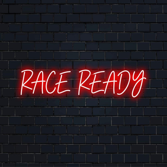 Brightly glowing custom LED neon sign titled Race Ready with sleek, dynamic lettering, ideal for neon light decor.