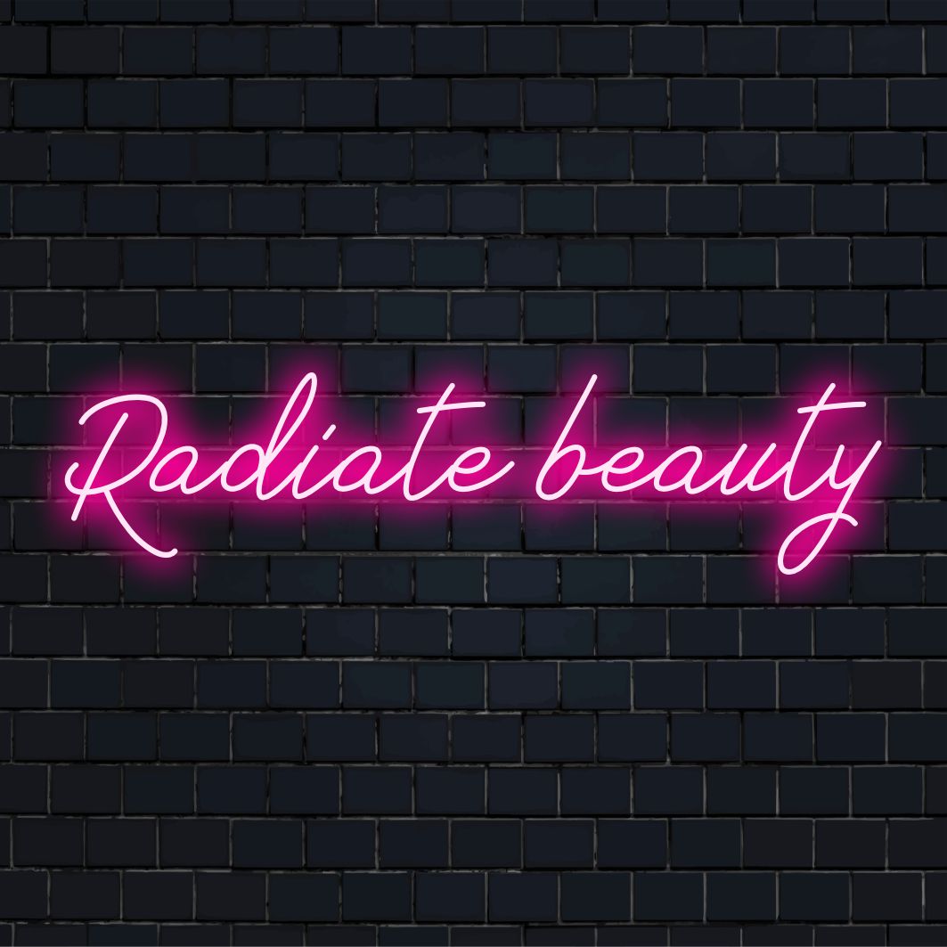 Custom made LED neon sign by The Art Neon brand featuring the phrase Radiate Beauty in vibrant neon colors.