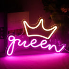A vibrant LED neon sign in the shape of the word "Queen" is displayed.