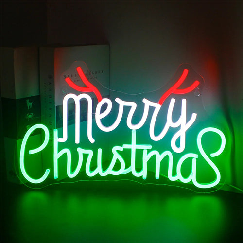 Ein helles, festliches LED-Neonschild mit dem Satz „Frohe Weihnachten“ in einer lustigen und einladenden Schrift.