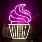 A vibrant LED neon sign in the shape of a cupcake, featuring a swirling pink frosting topped with a small red cherry.