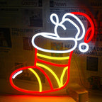 A vibrant LED neon sign depicting colorful Christmas socks.